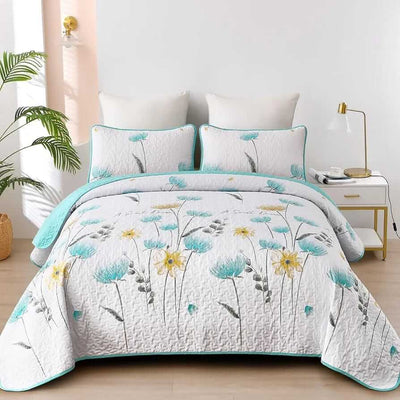 Floral patterned comforter set on a bed in a bedroom setting
