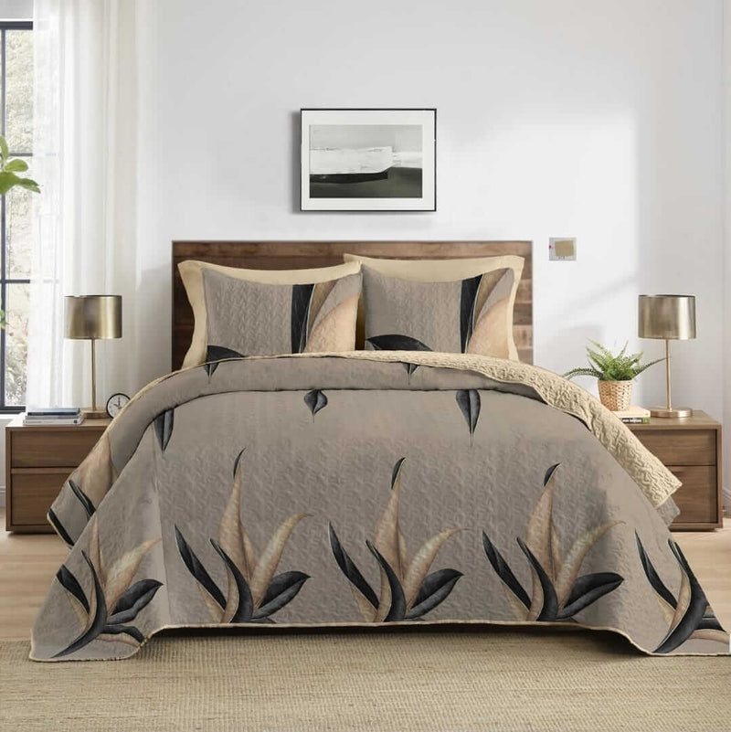 Bedding set with leaf pattern in a bedroom setting