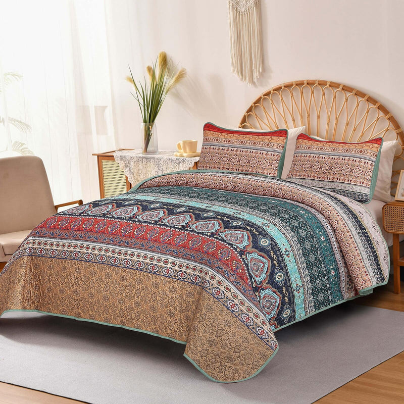 Floral patterned comforter set on a bed in a bedroom setting