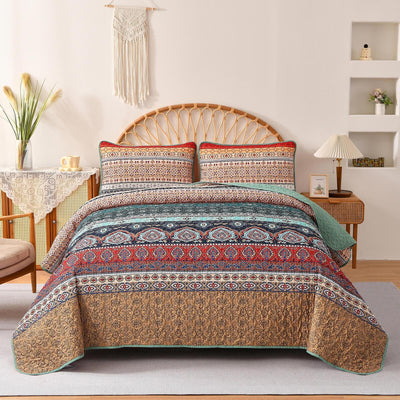 Floral patterned comforter set on a bed in a bedroom setting