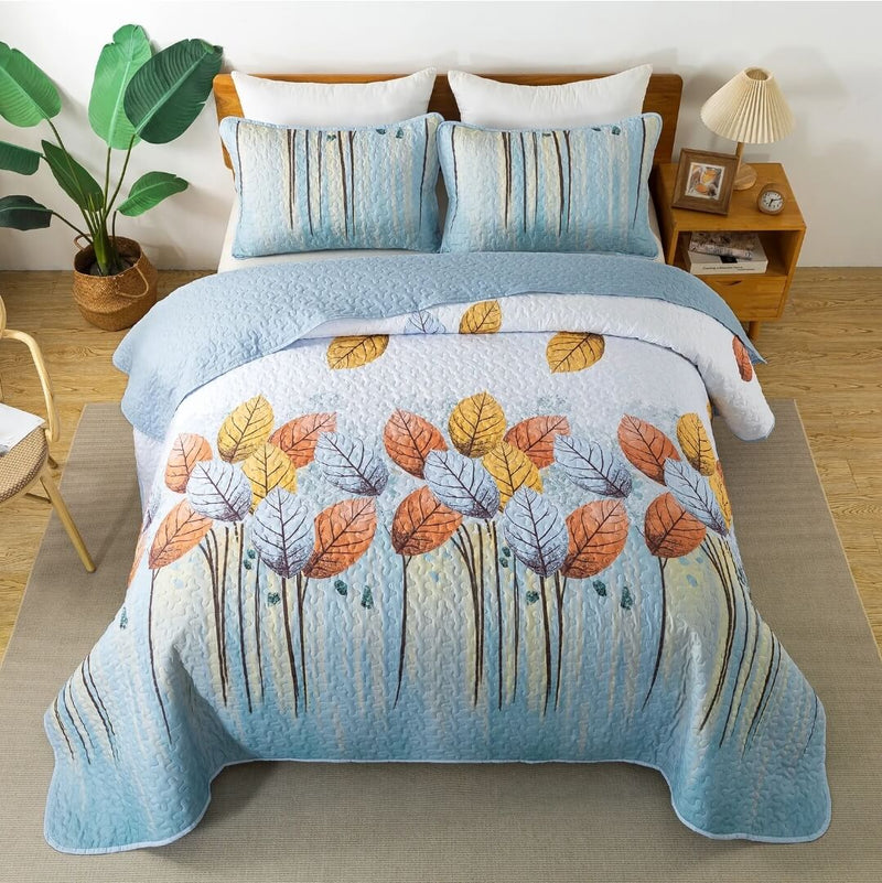 Bed with floral-patterned comforter in a bedroom setting